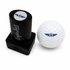 A Wings Stamp with quick-dry ink lies beside a white golf ball featuring a blue star and wings logo, both on a white background—ideal for fans wanting easy ball identification or a fun golf gift.