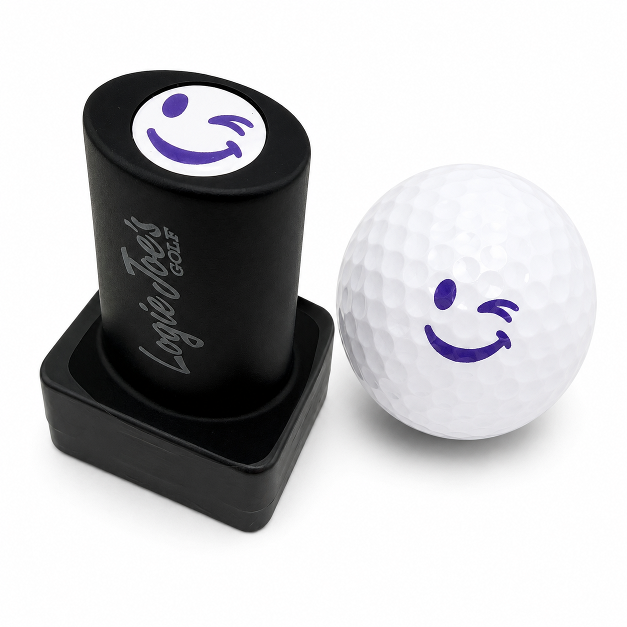 Personalize your game with the Winky Face Golf Ball Stamp—quick-dry ink stamper for easy ball identification. Includes a distinctive purple winking smiley face marking on any golf ball; a fun gift for golfers!.