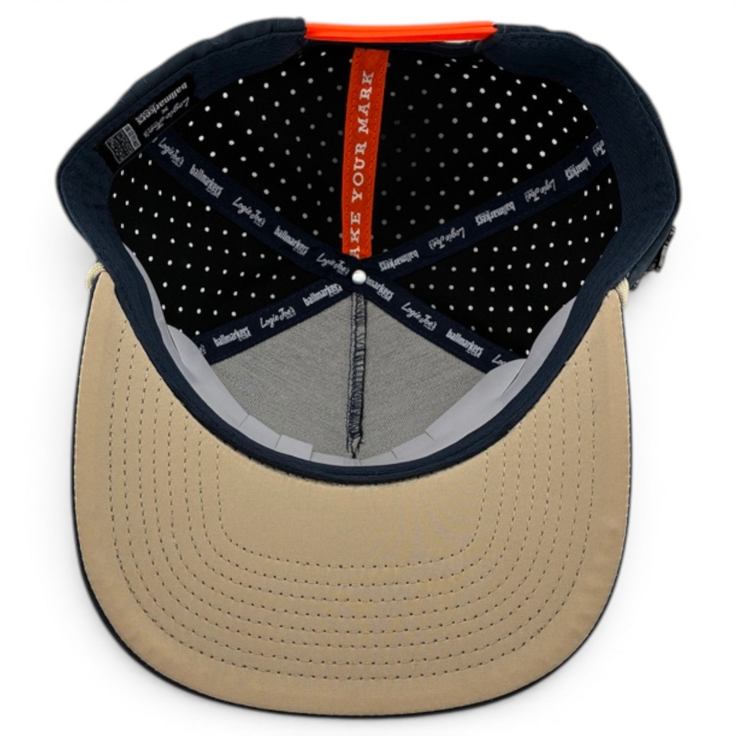 The Parrot Patrol Golf Hat features a steel blue and beige design, polka dot lining, black branded taping, tan brim, adjustable snapback, built-in magnetic ball marker holder with marker, and a red "MAKE YOUR MARK" strip inside.