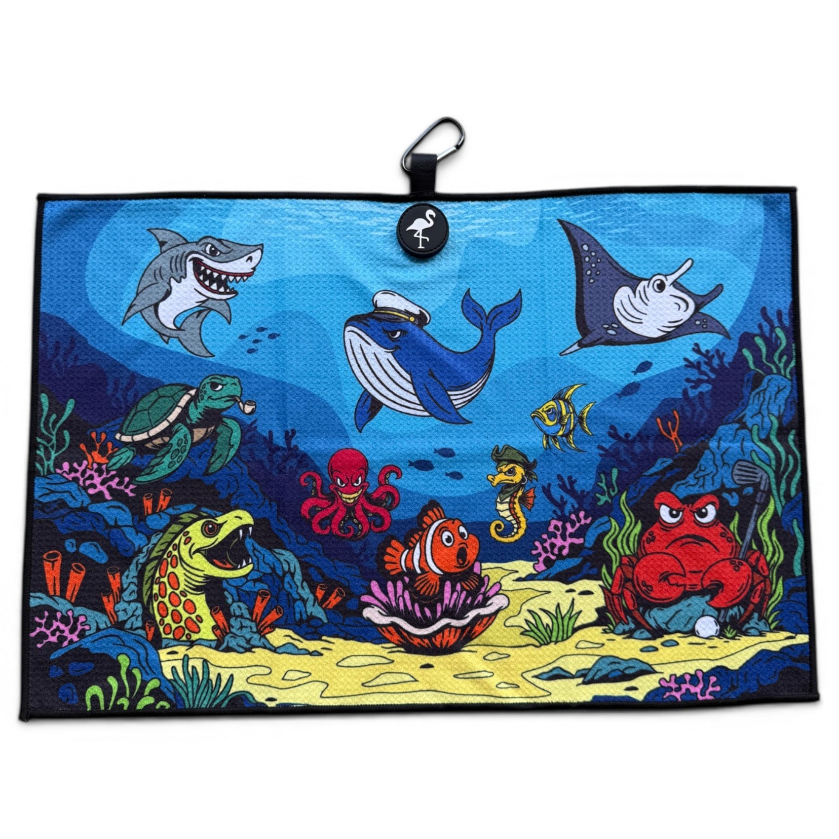 The Deep Blue Sea Golf Towel (24” x 16” microfiber) features cartoon sea animals among coral on a blue background; includes a magnetic clip and carabiner—perfect, colorful golf accessory.
