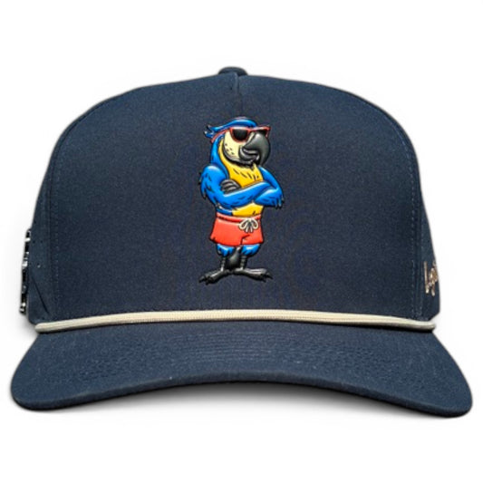 The Parrot Patrol Golf Hat is an adjustable navy snapback cap featuring an embroidered parrot with sunglasses, yellow shirt, and red shorts on the front, plus a built-in magnetic ball marker holder and marker included for golf convenience.