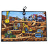 The Wrecking Crew Golf Towel is a 24” x 16” illustrated microfiber towel with cartoon vehicles like excavators, bulldozers, a cement mixer, and a MONDAY-labeled dump truck working in a layered pit. Includes magnetic clip & carabiner.