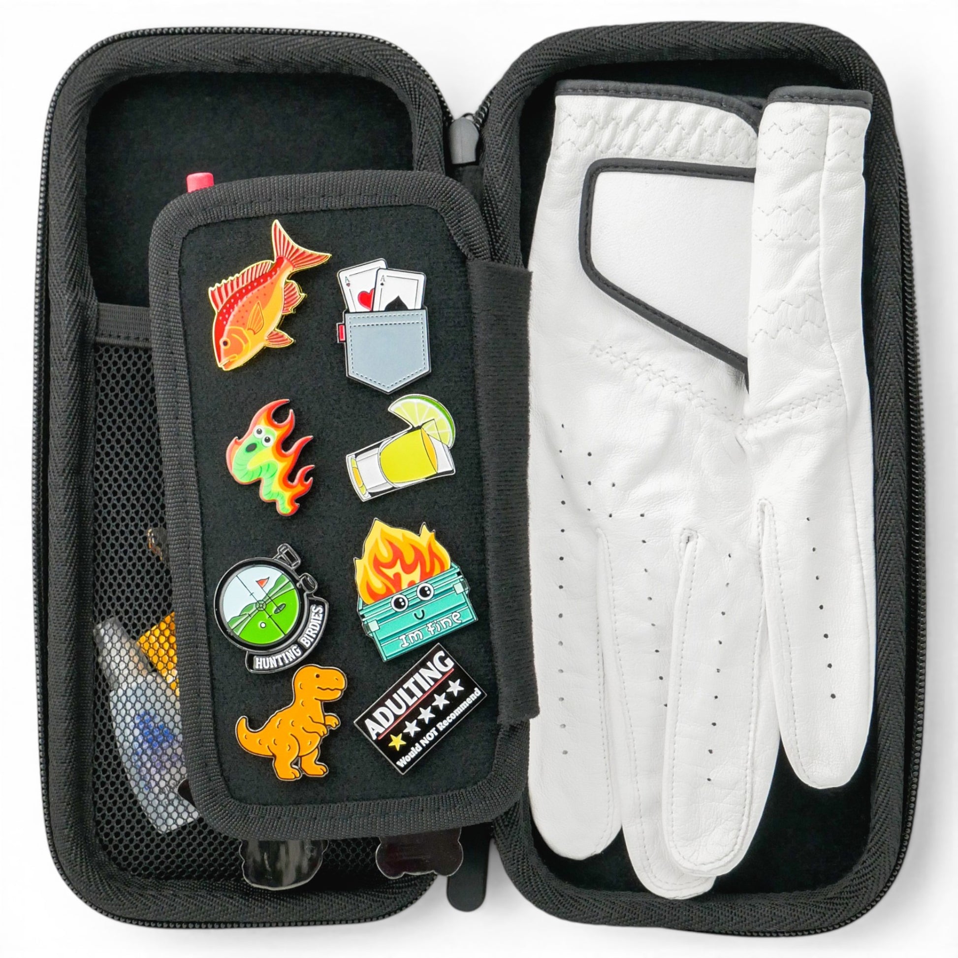 The Black/Pink Golf Accessory Case is a hard shell zippered organizer for your glove, ball markers, tees, and divot tools. With mesh pockets and pin display panel, it's perfect for stylishly storing golf essentials on the go.