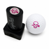 The Skull Ball Stamp features a pink skull and crossbones on black, offering quick-dry ink for easy golf ball identification—a fun, personalized accessory and ideal golf gift for enthusiasts.