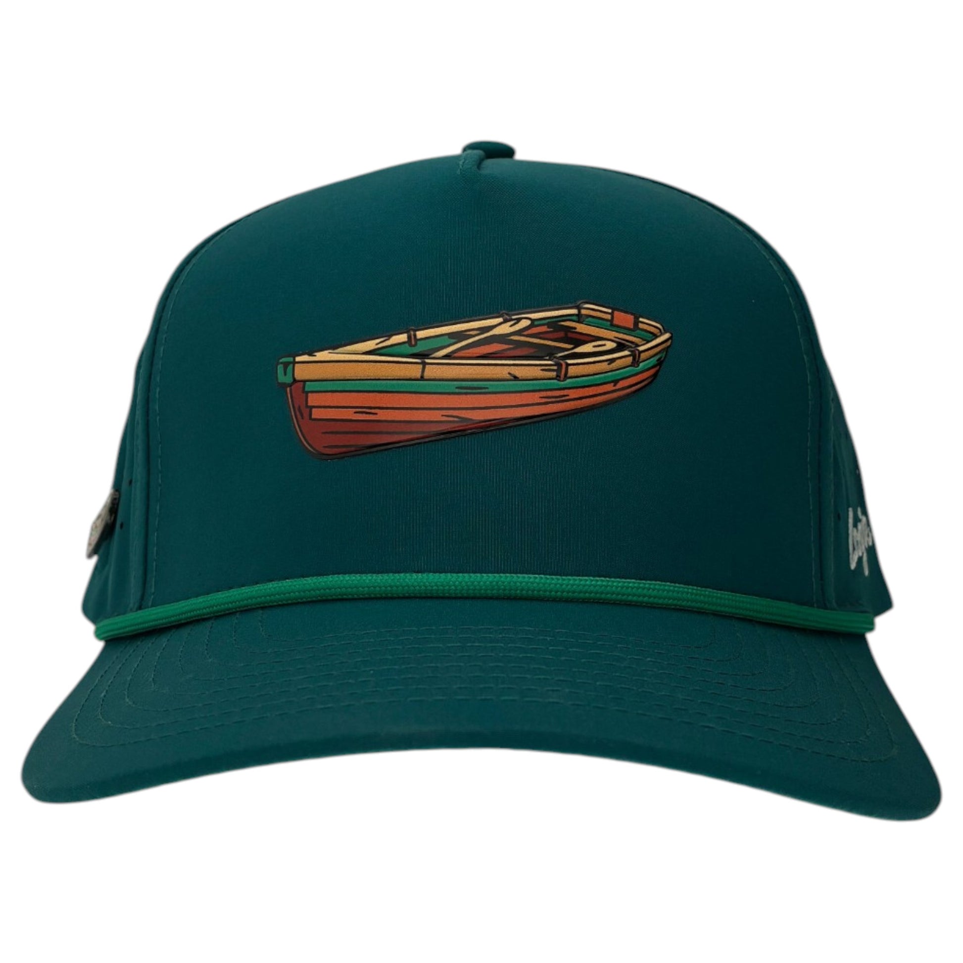 The Driftwood Golf Hat is an adjustable snapback cap in wood boat teal, featuring a small wooden rowboat on the front, a green rope above the visor, and a built-in magnetic ball marker holder with marker included.