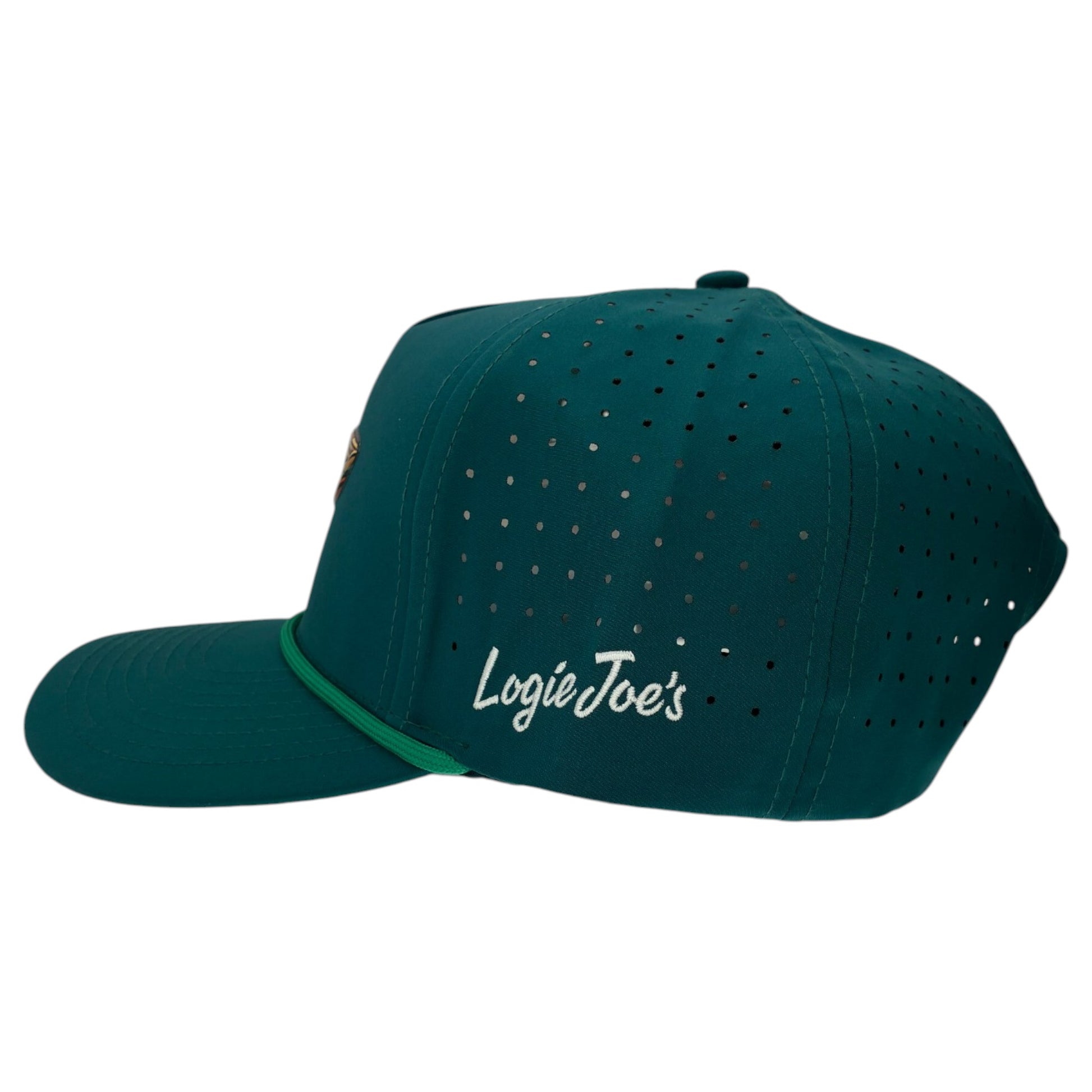 The Driftwood Golf Hat in Wood Boat Teal features a curved bill, perforated side panels, white Logie Joes script, green brim accent, adjustable snapback, and a built-in magnetic ball marker holder with marker included.
