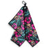 The Tiki Totem Golf Towel (24”x16”) features a tropical design with pink hibiscus, green leaves, and tiki faces. This premium microfiber towel has a magnetic clip, carabiner, and flamingo logo—perfect for keeping your golf gear stylishly clean.