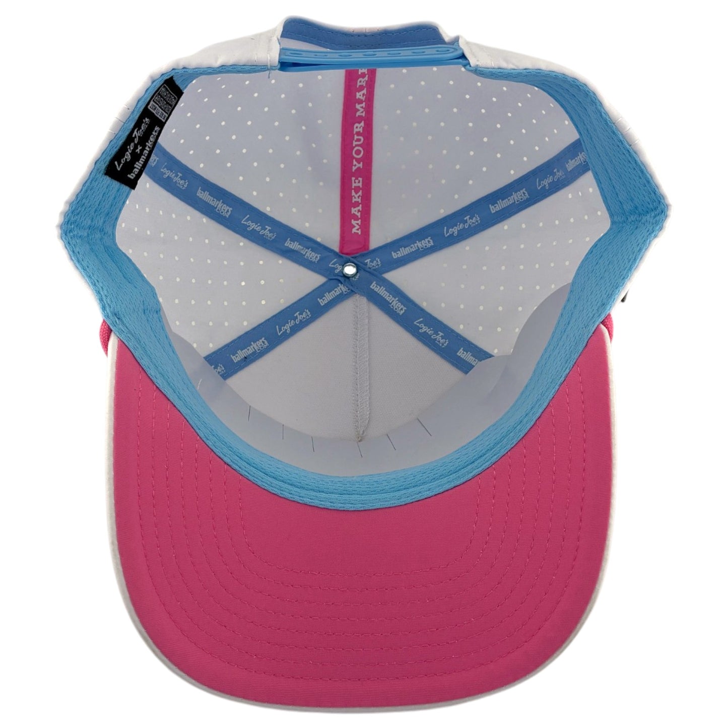Inside the Sugar Rush Golf Hat | Snapback Cap, you'll find a pink brim, blue accents, white mesh panels, blue Legacy 92 bands, and a built-in magnetic ball marker holder with marker included—plus it's adjustable in Cotton Candy style.