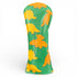 The Dino Nugget Fairway Wood Headcover features a premium durable synthetic leather exterior with yellow and orange cartoon dinosaur silhouettes, plus a soft protective interior to keep your club safe.
