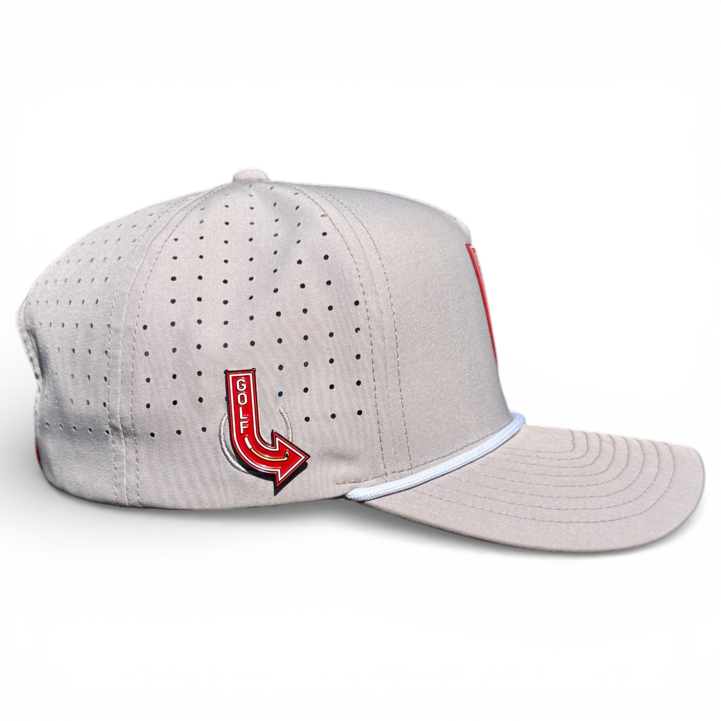 The Golf Neon Arrow Sign Golf Hat is a light gray, adjustable snapback cap with a curved brim, perforated side panels, white piping, and a built-in magnetic ball marker holder plus marker for convenience. Features a red arrow-shaped "GOLF" pin on the left.