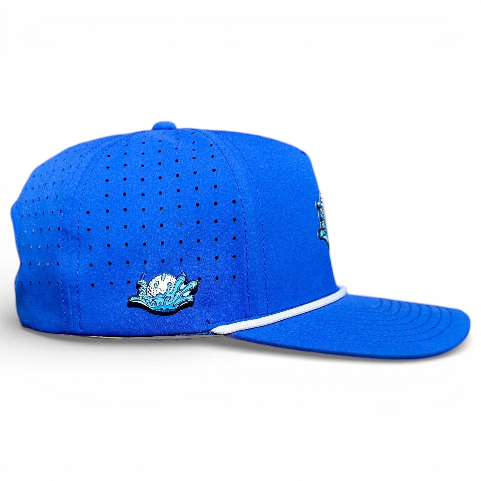 The royal blue Water Ball Golf Hat is a snapback cap with ventilation holes, white-trimmed brim, wave-and-baseball patch, and comes with a built-in magnetic ball marker holder plus marker. Adjustable fit stands out against the plain white background.
