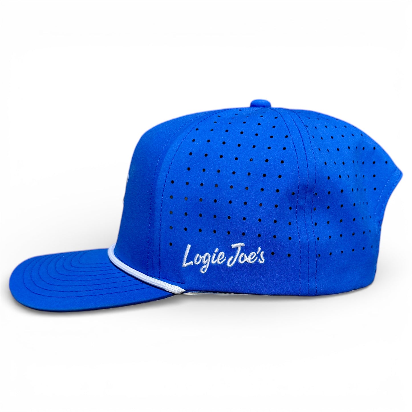 A royal blue Water Ball Golf Hat snapback with ventilation holes, white piping, and “Logie Joe’s” embroidered in white. Features an adjustable fit plus a built-in magnetic ball marker holder with included marker—perfect for golf fans.
