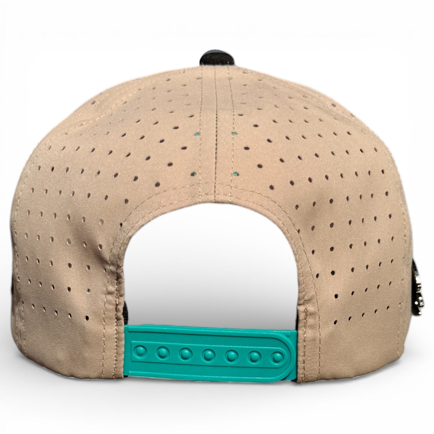 The image shows the back of the Salty Turtle Golf Hat, a beige perforated snapback cap with an adjustable teal plastic closure and built-in magnetic ball marker holder (marker included), displayed against a white background.