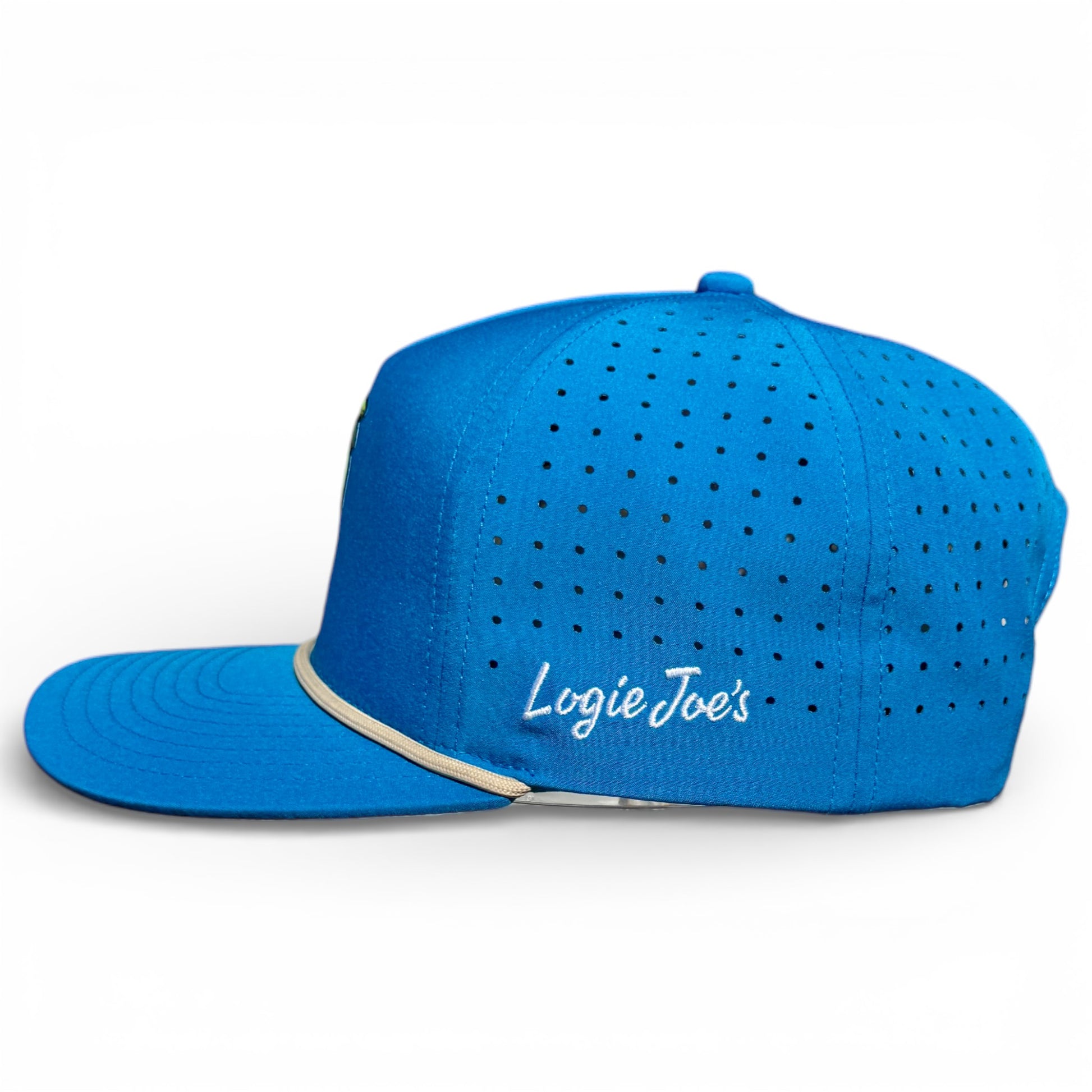 The Fairway Palms Golf Hat is a bright blue snapback cap with small ventilation holes, tan brim accent, white "Logie Joes" embroidery, built-in magnetic ball marker holder with marker, adjustable fit, and one size.