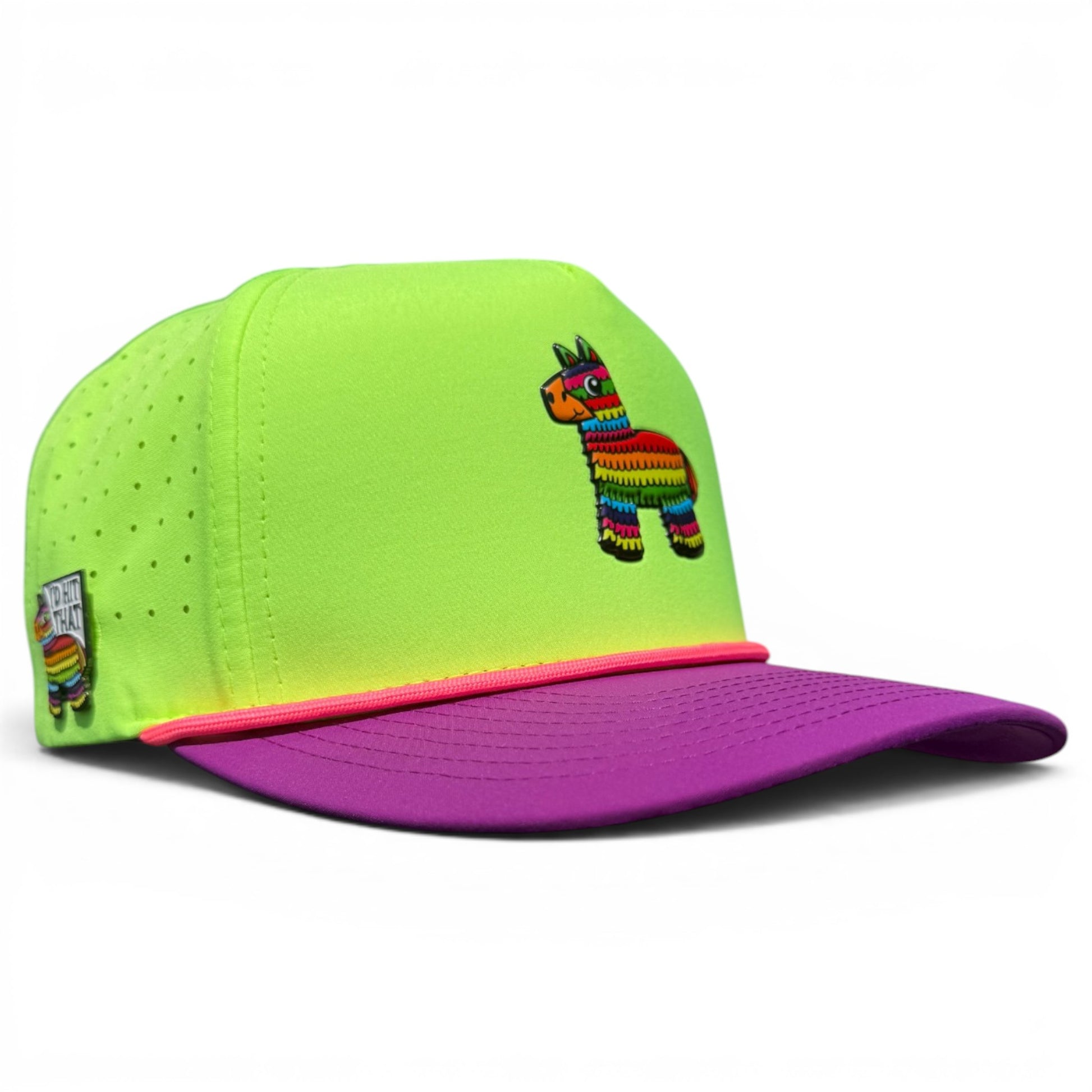 The "I'd Hit That Piñata Golf Hat" is a neon green and purple snapback cap with a colorful embroidered llama, pink visor trim, ventilation holes, and a built-in magnetic ball marker holder with marker included. Adjustable for comfort.