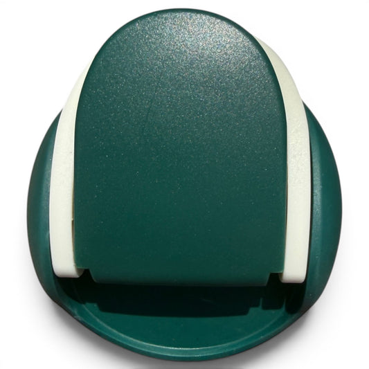 A green and white plastic desktop tape dispenser, seen from above, mimics the sleek look of the Hydration Bottle – The Longhorn 32oz Insulated Stainless Steel with flip straw lid and handle; cutting edge and tape slot are visible.