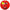 A round red tag shows a glass of red drink with ice, lemon, straw, and grapes over abstract shapes. "Louie Joes" appears below, making this Transfusion Golf Putting Disc a striking indoor practice marker and portable golf training aid.