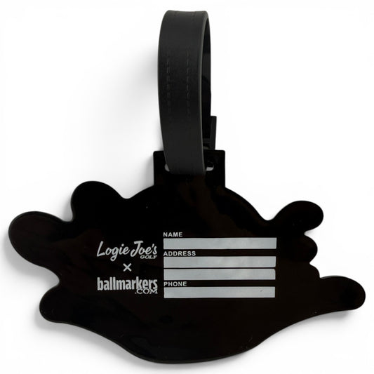 The Water Ball Clip-On Tag is a multi-use bag tag and golf accessory with spaces for your name, address, and phone number. It features Logie Joes Golf and ballmarkers.com logos plus a black strap for easy attachment to any bag.