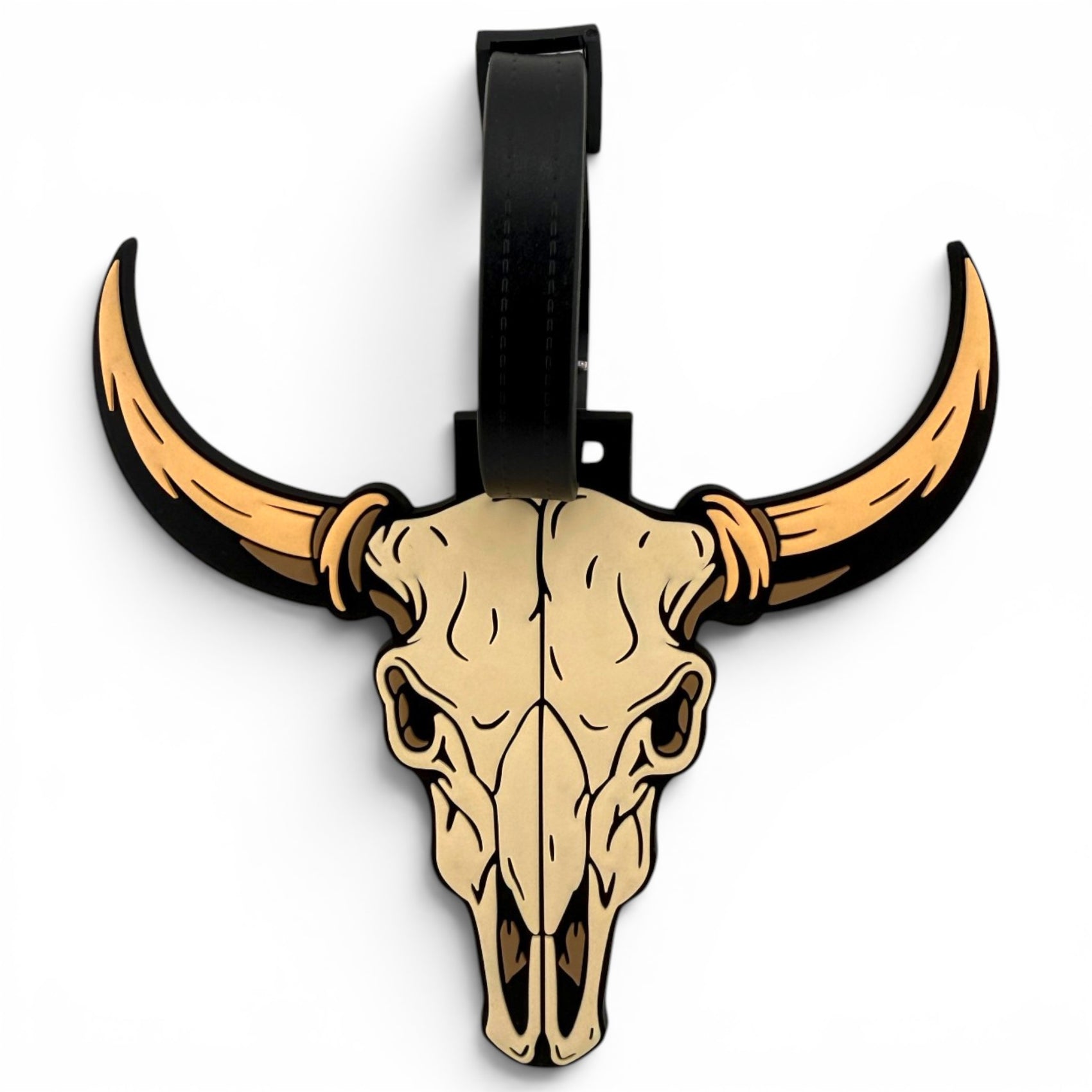 The Longhorn Clip-On Tag is a beige and black stylized cattle skull with curved tan horns that works as a unique multi-use bag tag, travel tag, or golf accessory, shown on a white background.