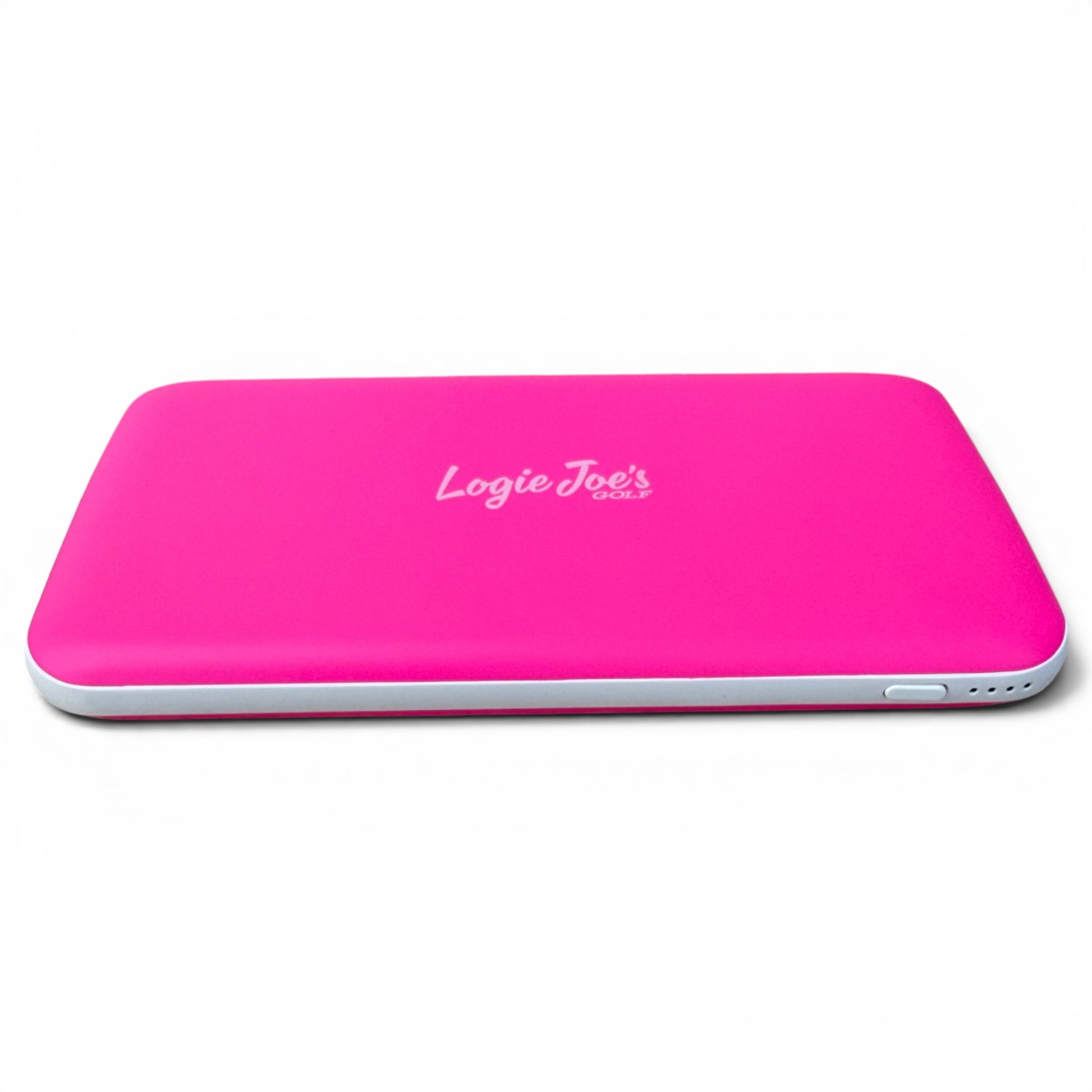 A slim, rectangular pink Fast Charge Power Bank (10,000mAh) with "Logie Joes" in white on top rests on a white surface; it features rounded edges, a side button, and USB-C fast charging for iPhone & Android.