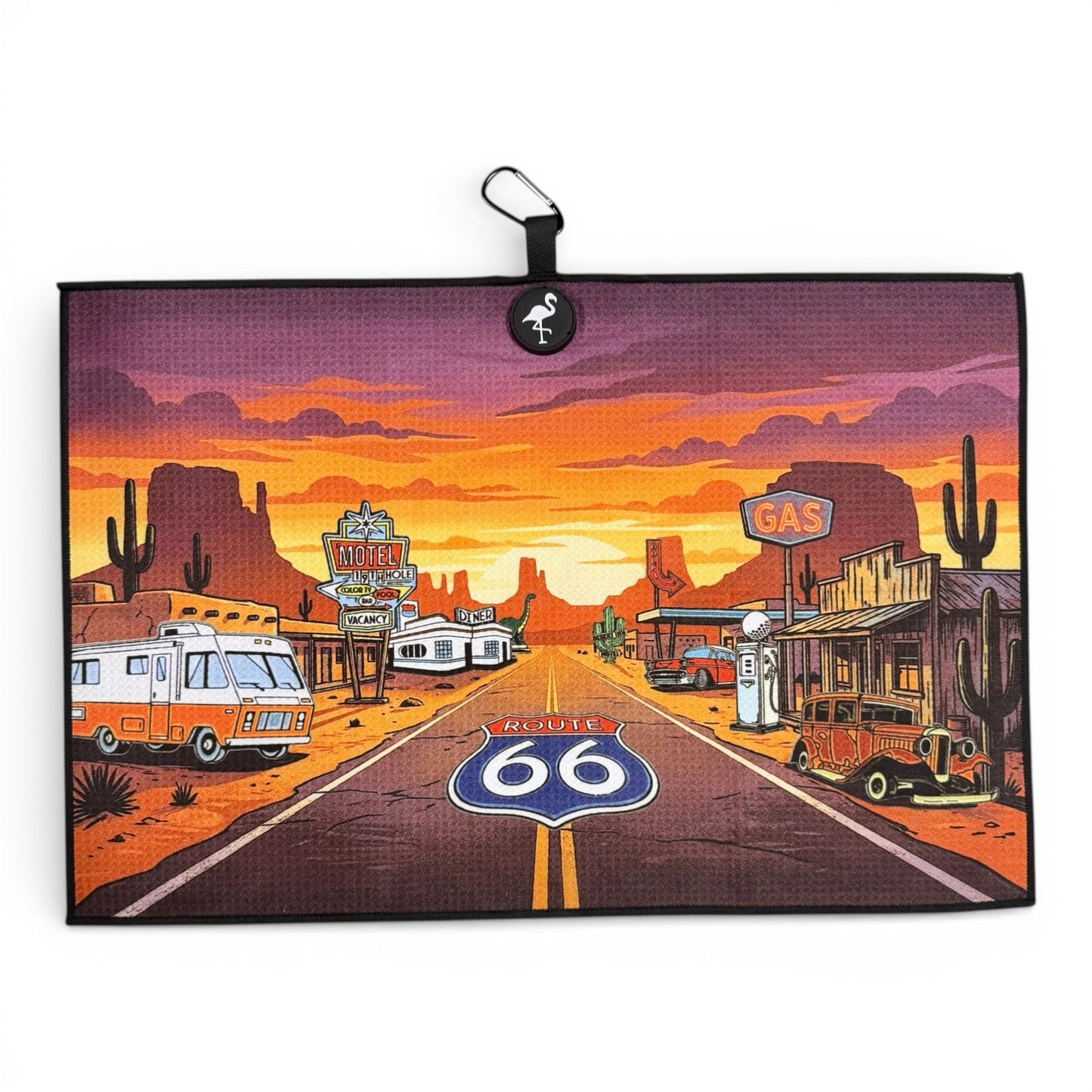 A vibrant Route 66 sunset scene with deserts, cacti, vintage cars, and motels highlights the iconic shield—perfect for fans of Americana and golfers. Try the Route 66 Golf Towel: premium double-sided microfiber, magnetic, with carabiner clip (24x16 in).