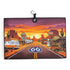 A vibrant Route 66 sunset scene with deserts, cacti, vintage cars, and motels highlights the iconic shield—perfect for fans of Americana and golfers. Try the Route 66 Golf Towel: premium double-sided microfiber, magnetic, with carabiner clip (24x16 in).
