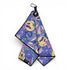 The Purple Haze Golf Towel features a 90s-inspired design with yellow smiley faces, purple flowers, and pastel shapes. This 24 x 16 in premium double-sided microfiber towel includes a black border, magnetic feature, and carabiner clip.