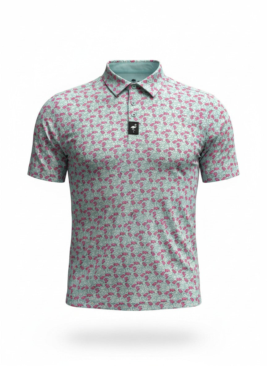 The Men's Frosted Animal Cookies Golf Polo is a moisture-wicking, performance stretch golf shirt with short sleeves and a playful pink flamingo print on light blue, shown on a plain white backdrop.