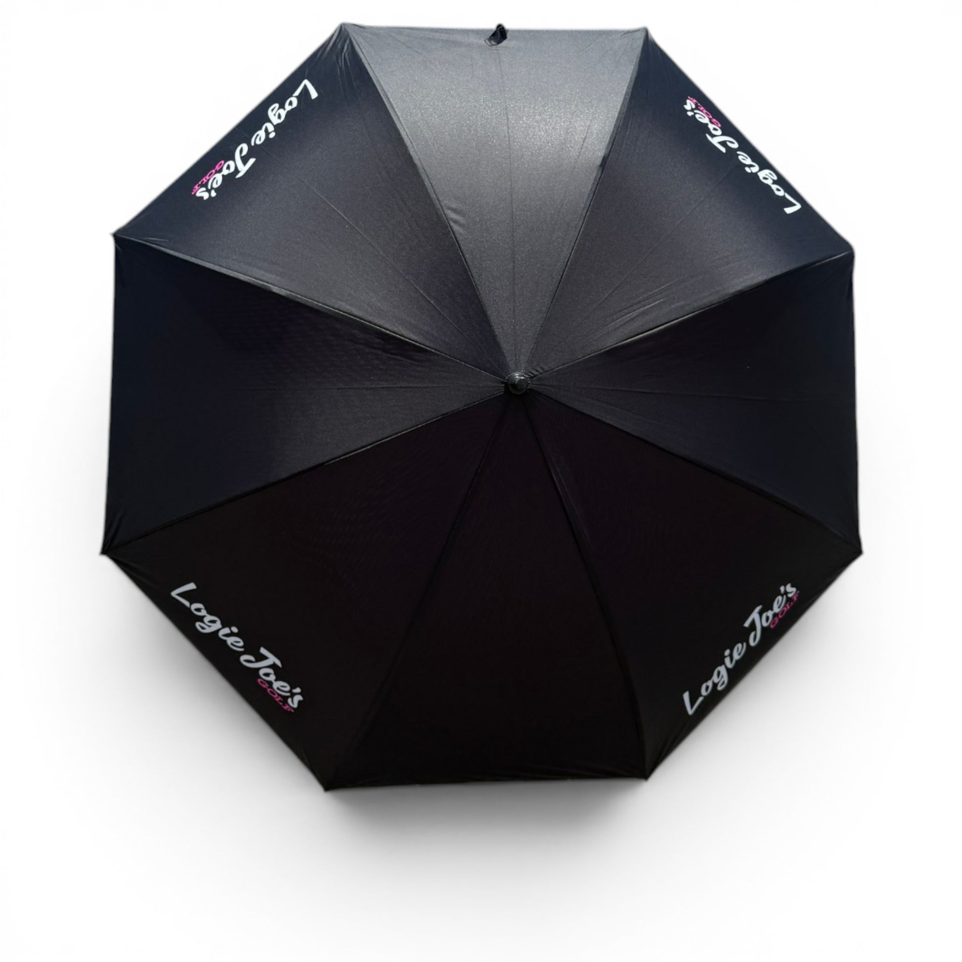The 60" Golf Umbrella | Oversized Black & Pink Golf Umbrella is shown from above, with “Logie Joe’s” in white and pink on several black panels near the edges. Its large size provides excellent rain protection against a white background.