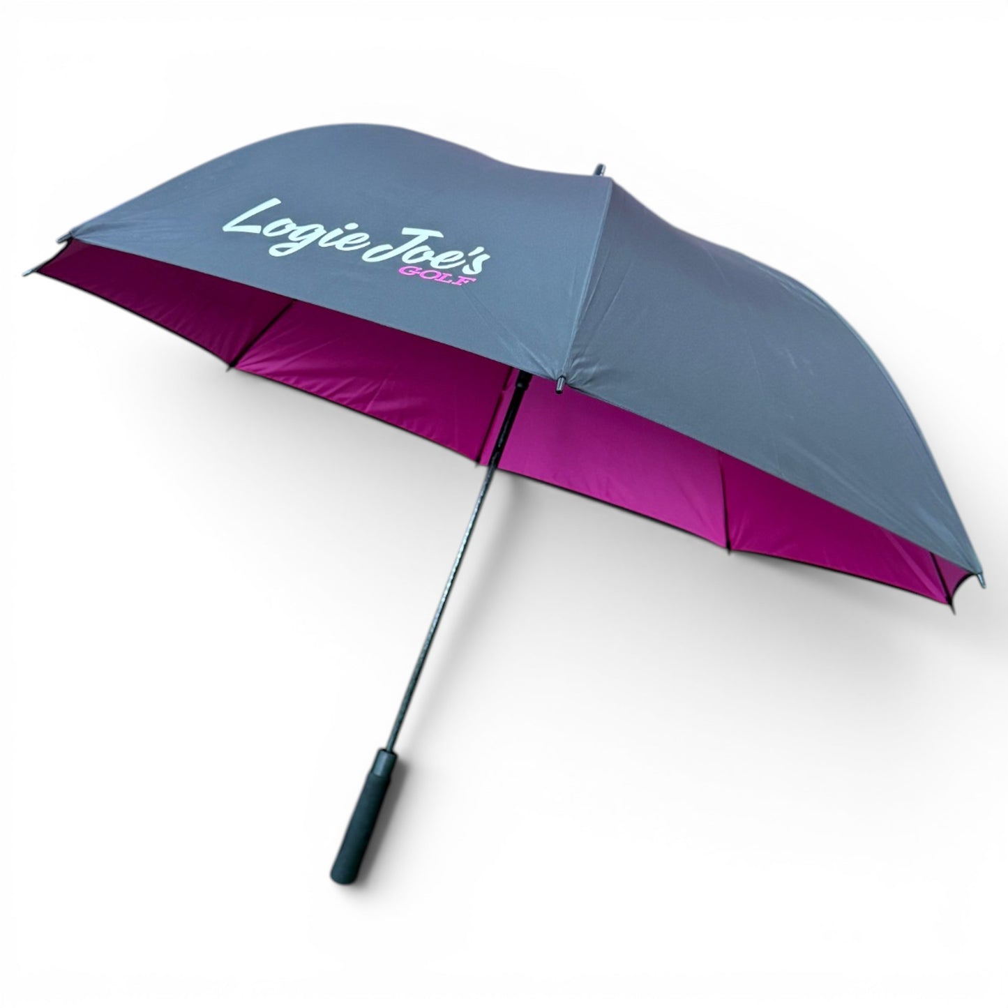 The 60" Golf Umbrella | Oversized Black & Pink Golf Umbrella features a grey exterior, magenta interior, "Logie Joes Golf" in white and pink on the canopy, a black handle, and is shown on a white background for maximum rain protection.
