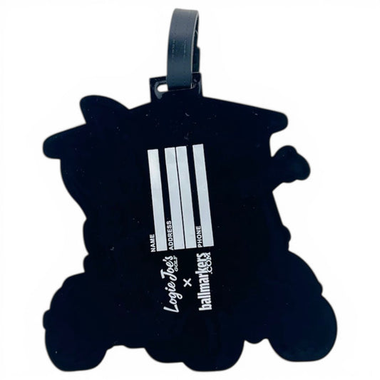 The Elephant Clip-On Tag is a cartoon-shaped, black bag tag with white fields for name, address, and phone number. Its gray strap attaches easily to luggage or golf bags, making it a fun and practical travel or sports accessory.