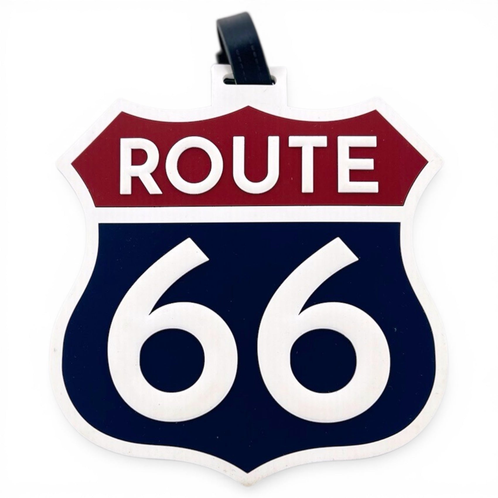 The RT 66 Clip-On Tag is a multi-use bag tag and travel accessory featuring a classic Route 66 shield design—ideal for bags or golf gear.
