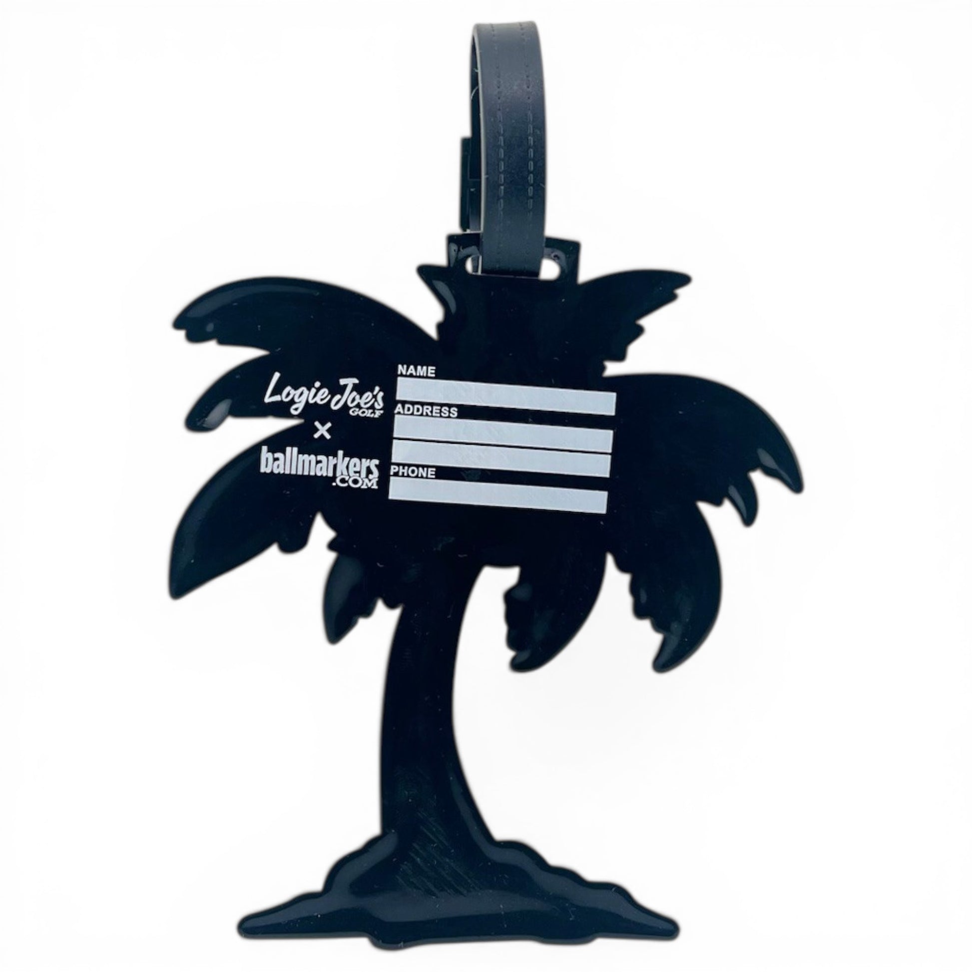 The Fairway Palms Clip-On Tag is a black palm tree-shaped bag tag with white fields for Name, Address, and Phone—perfect as a travel or golf accessory. Features Louie Joes x ballmarkers branding and a black attachment strap.