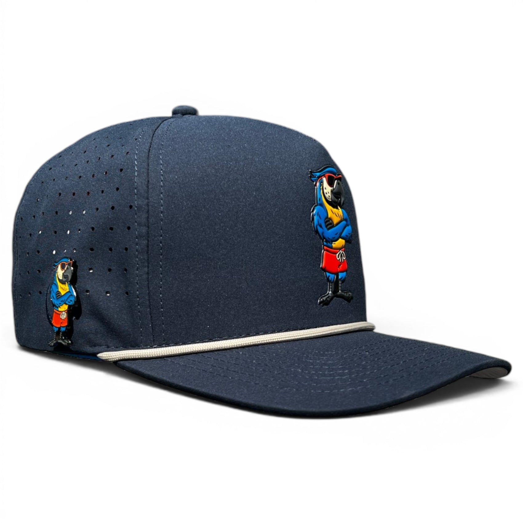 The Parrot Patrol Golf Hat is an adjustable navy snapback cap featuring a perforated side panel, two embroidered pirate parrots, and a built-in magnetic ball marker holder with marker included—perfect for golf enthusiasts.