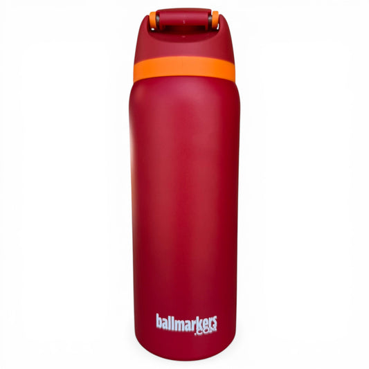 The Hydration Bottle – Parrot is a 32oz insulated stainless steel water bottle in red with an orange band near the lid, flip straw lid with handle, and “ballmarkers” printed in white—designed for superior cold retention.