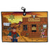 A cheerful cowboy with an axe stands by a saloon, wanted poster, cow skull, and covered wagon; a woman in saloon attire holds the Wild Wild West Golf Towel—a 24"x16" microfiber towel with magnetic clip—amidst a desert backdrop.