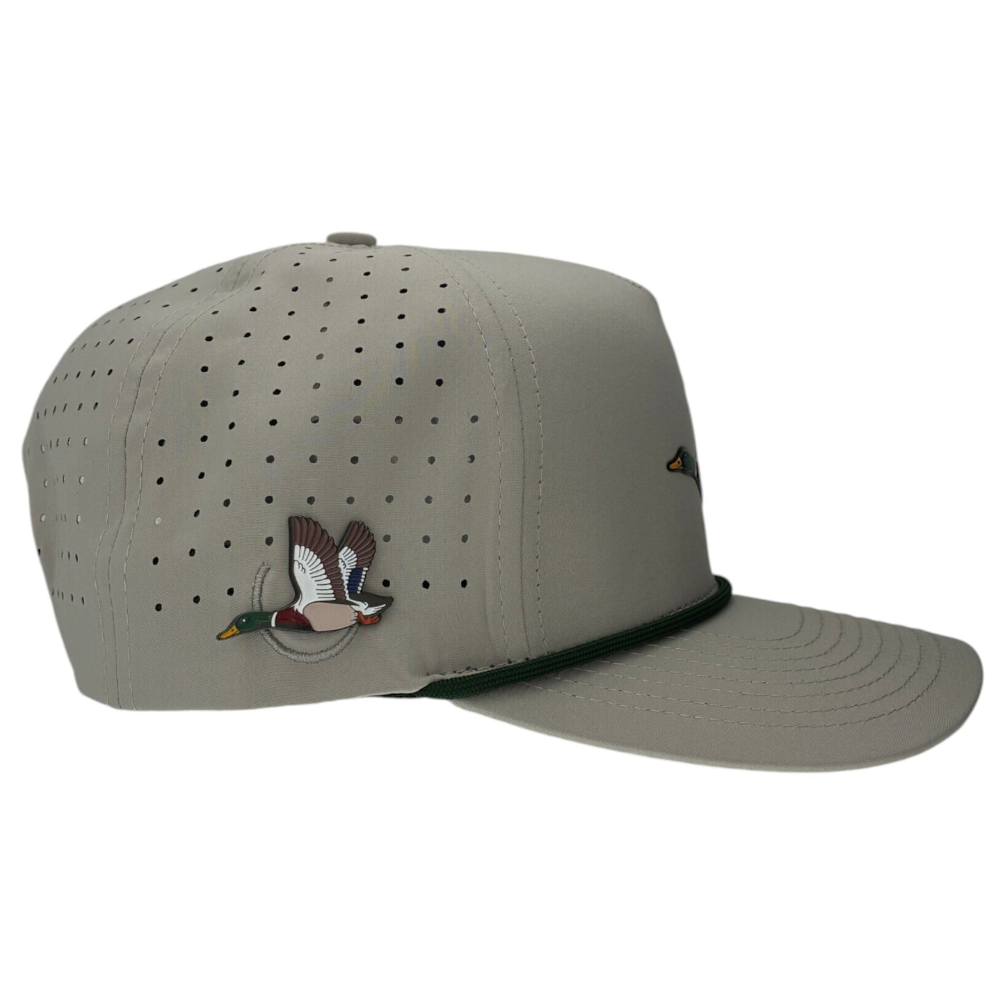 The Mallard Golf Hat is a light gray snapback cap with small ventilation holes, green brim trim, and an embroidered duck. It features an adjustable fit plus a built-in magnetic ball marker holder with marker included—perfect for your golf game.