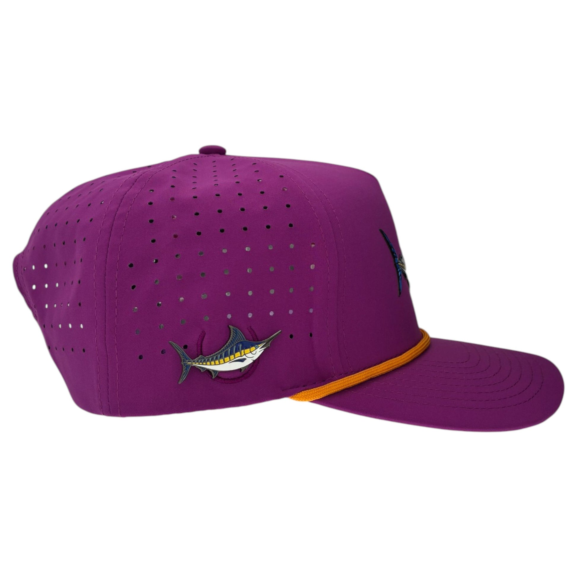 The Marlin Golf Hat is an adjustable purple snapback cap with a built-in magnetic ball marker holder (marker included), small ventilation holes, an embroidered marlin fish on the side, and a thin yellow band above the brim.