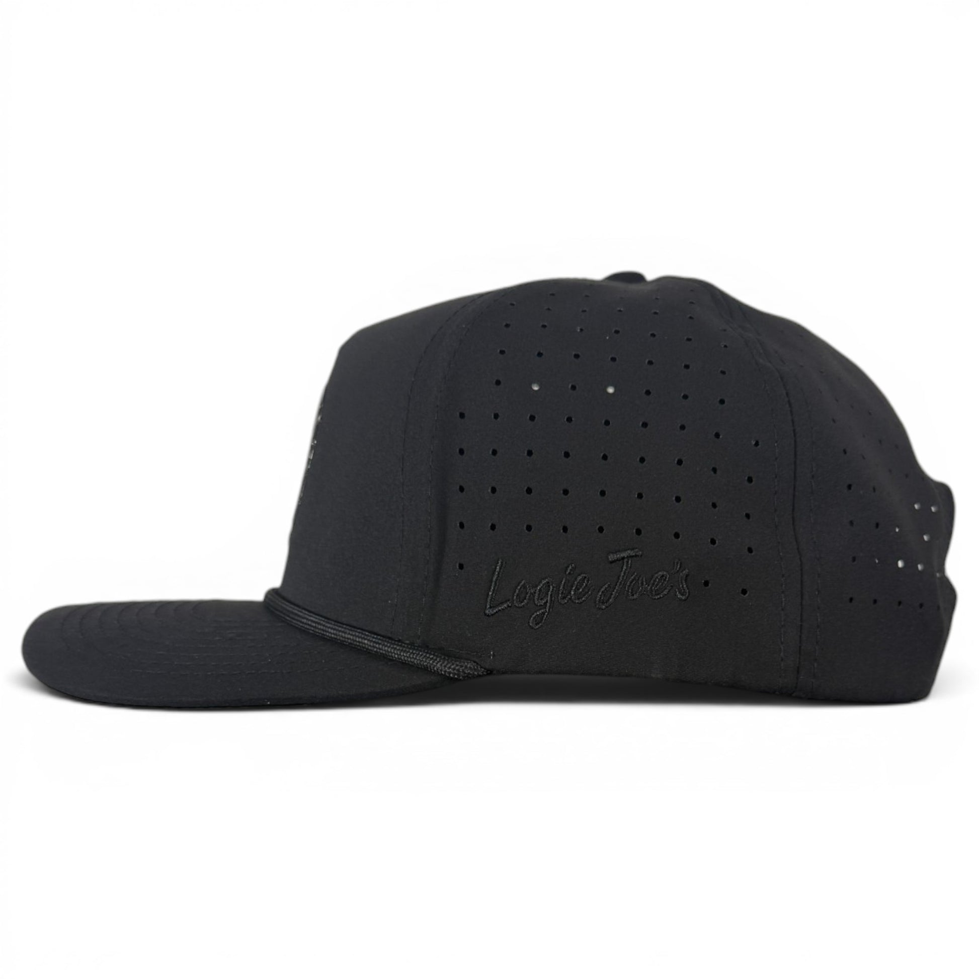 The Night Stalker Golf Hat in Animal Eyes Black is an adjustable snapback cap with a built-in magnetic ball marker holder and included marker, shown left side view on a white background.