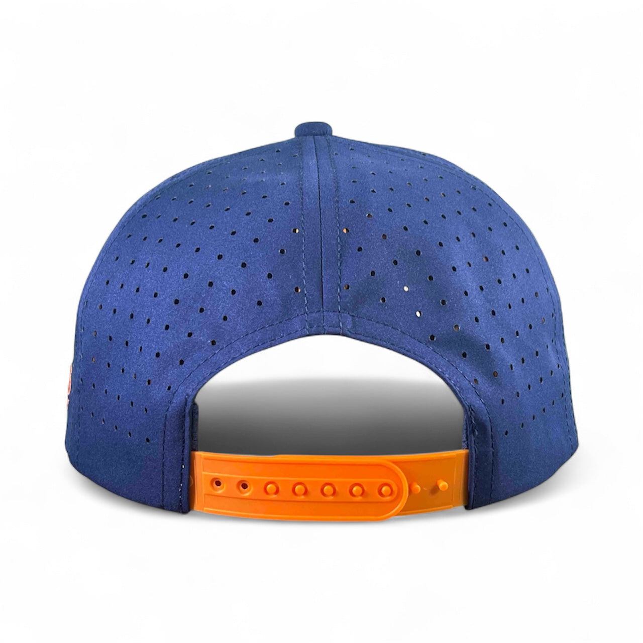 The Dino Nugget Golf Hat is a blue snapback cap with perforated back, orange adjustable closure, and built-in magnetic ball marker holder (marker included)—ideal for golfers or pairing with your favorite Dino Nugget Hat.