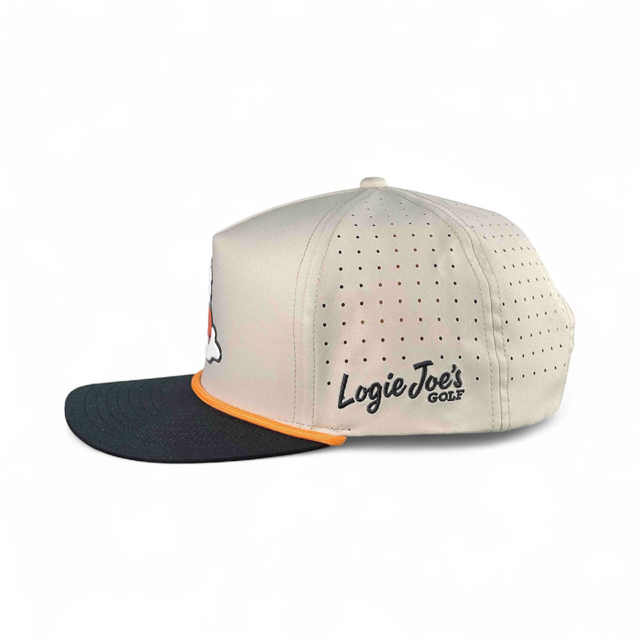 The Breakfast Ball Golf Hat is an adjustable mulligan tan snapback cap with a built-in magnetic ball marker holder (marker included), orange brim accent, ventilation holes, and "Logie Joes GOLF" embroidered on the side.