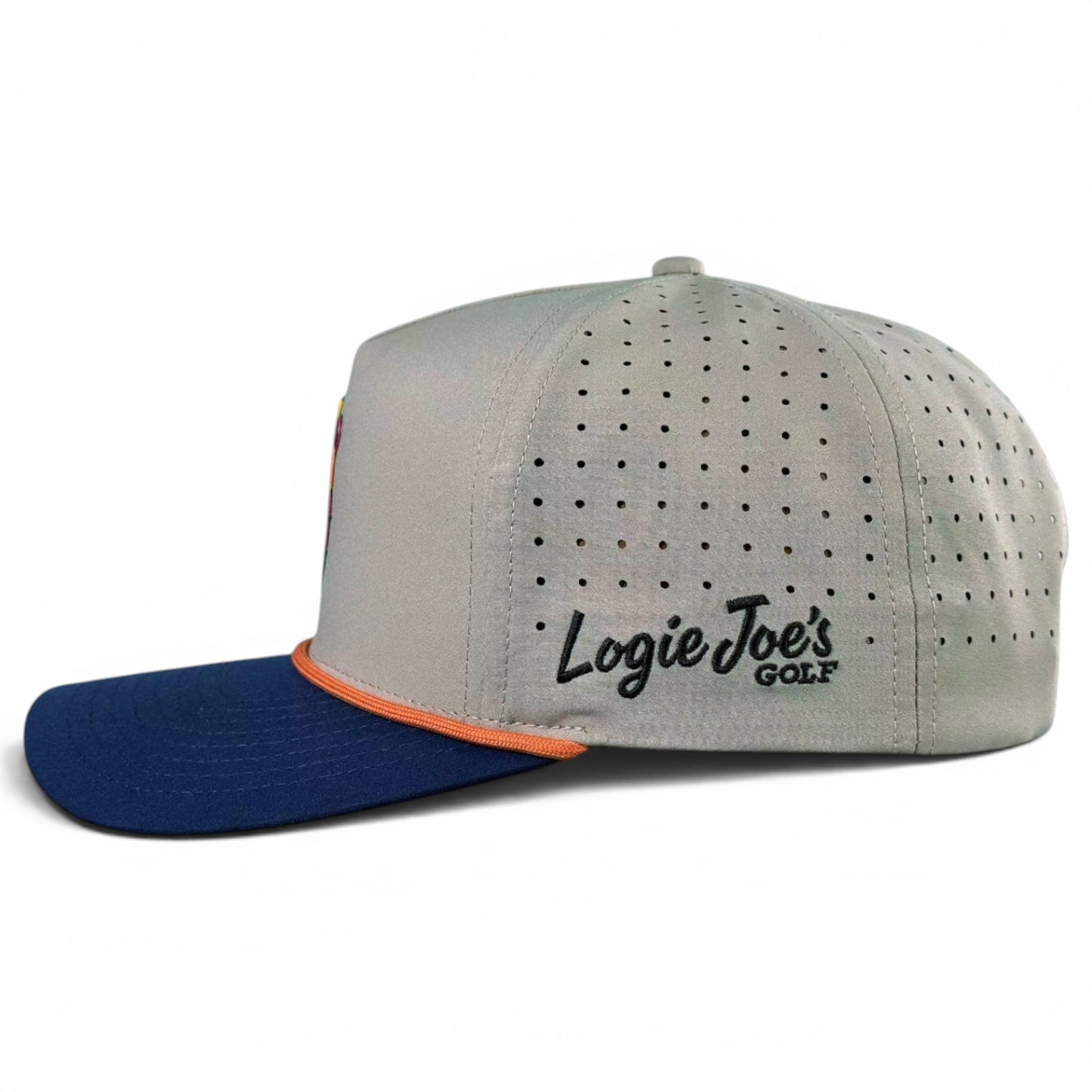 The Tiki Bear Golf Hat is a gray snapback cap with a blue brim, orange trim, and ventilation holes. "Logie Joes GOLF" is embroidered on the side in black and green. Features an adjustable fit and built-in magnetic ball marker holder with marker.