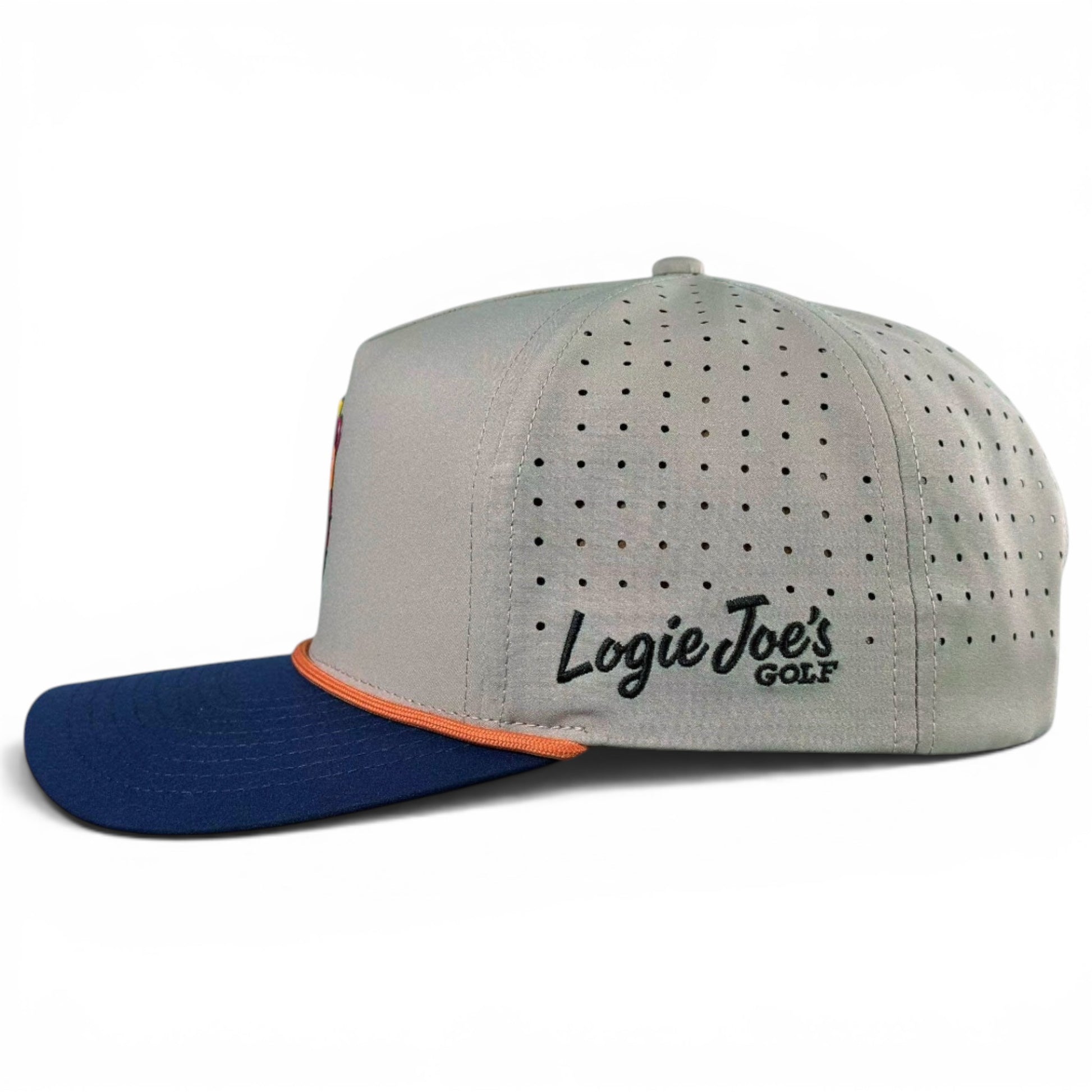 The Tiki Bear Golf Hat is a gray snapback cap with a blue brim, orange trim, and ventilation holes. "Logie Joes GOLF" is embroidered on the side in black and green. Features an adjustable fit and built-in magnetic ball marker holder with marker.