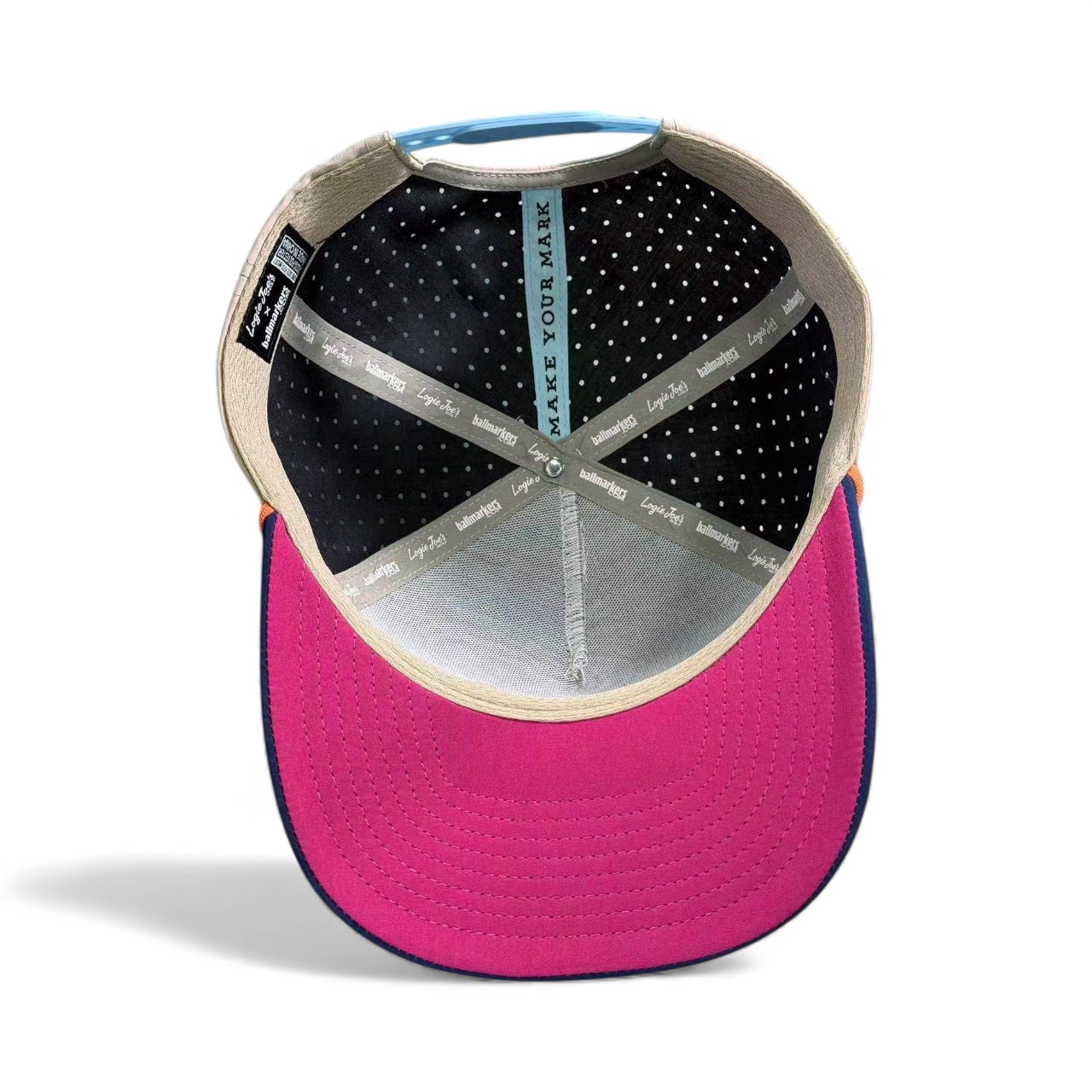 The image shows the inside of a Tiki Bear Golf Hat Snapback Cap. It has a bright pink brim, patterned inner band with "MAKE YOUR MARK" and "LidsHD", stitched lining, and includes a built-in magnetic ball marker holder with marker.