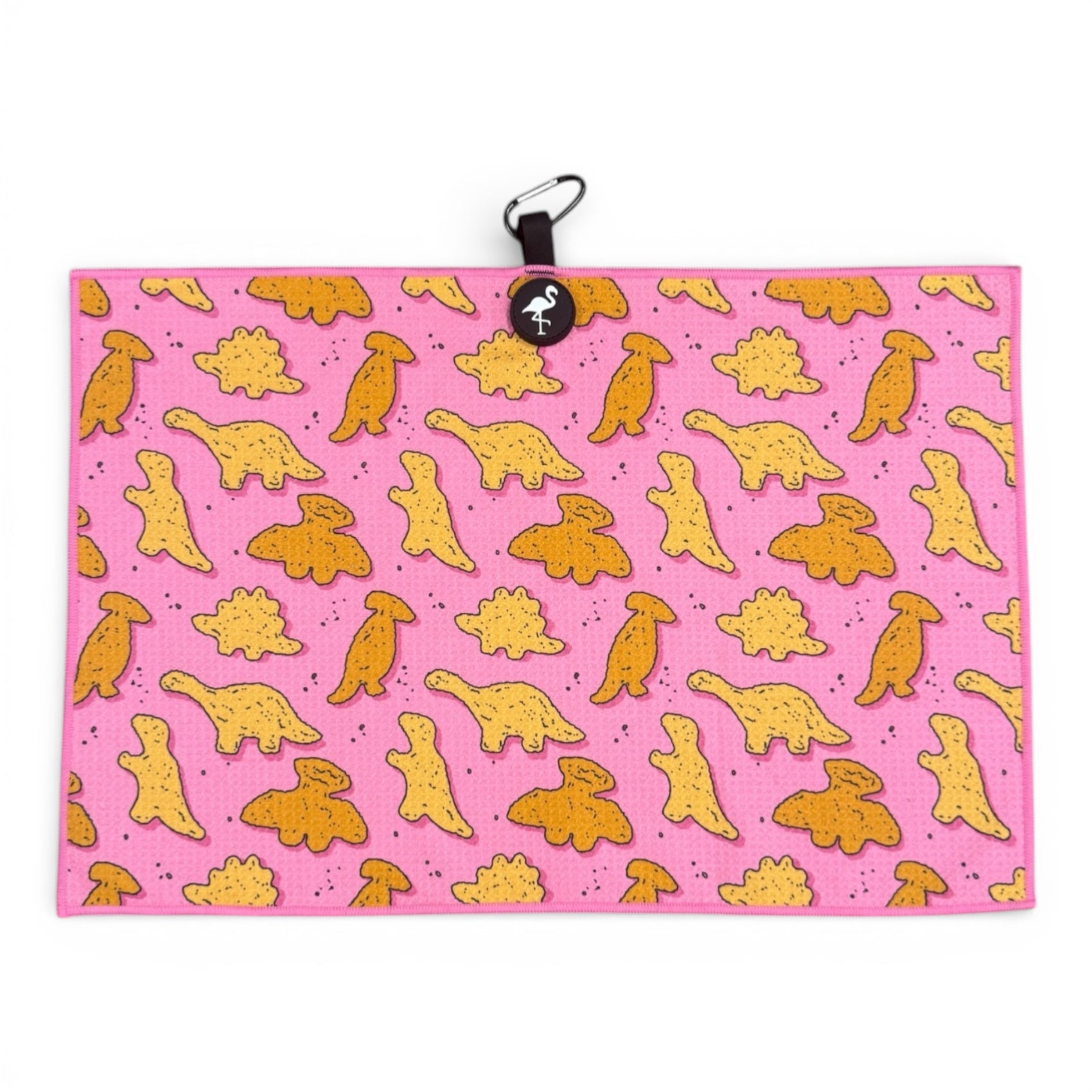 The Pink Dino Nugget Golf Towel (24x16 in) features yellow and orange cartoon dino nuggets on pink microfiber, with a heavy-duty magnetic design, carabiner clip, and round logo—an ideal gift for golfers.