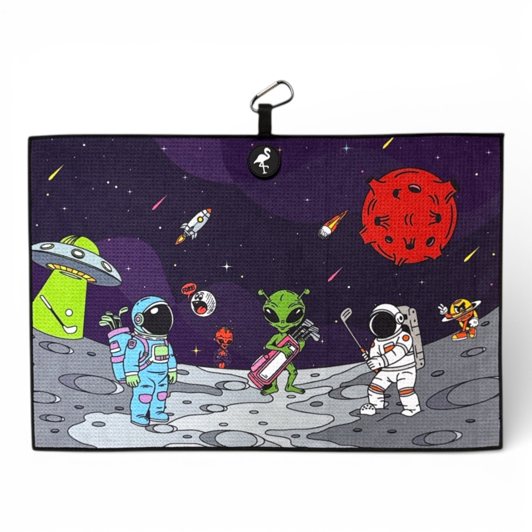 Cartoon of two astronauts and a green alien golfing on the moon with spaceships and a red planet, featuring the Mission to Pars Golf Towel—premium double-sided microfiber, magnetic towel with carabiner clip, 24x16 in.