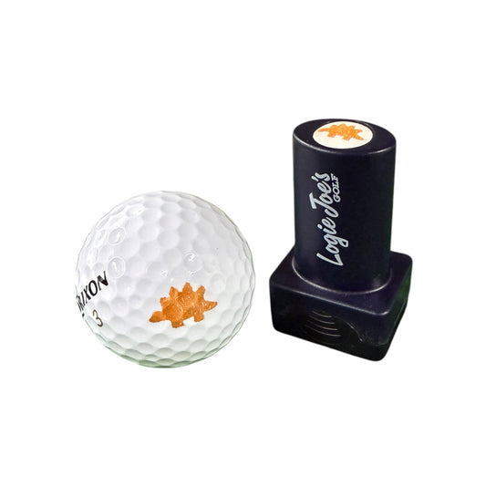 A set of three golf ball stamps—flamingo, pineapple, and dino nugget designs—features quick-dry ink for easy ball identification; perfect for customizing your golf accessories or as a fun golf gift.