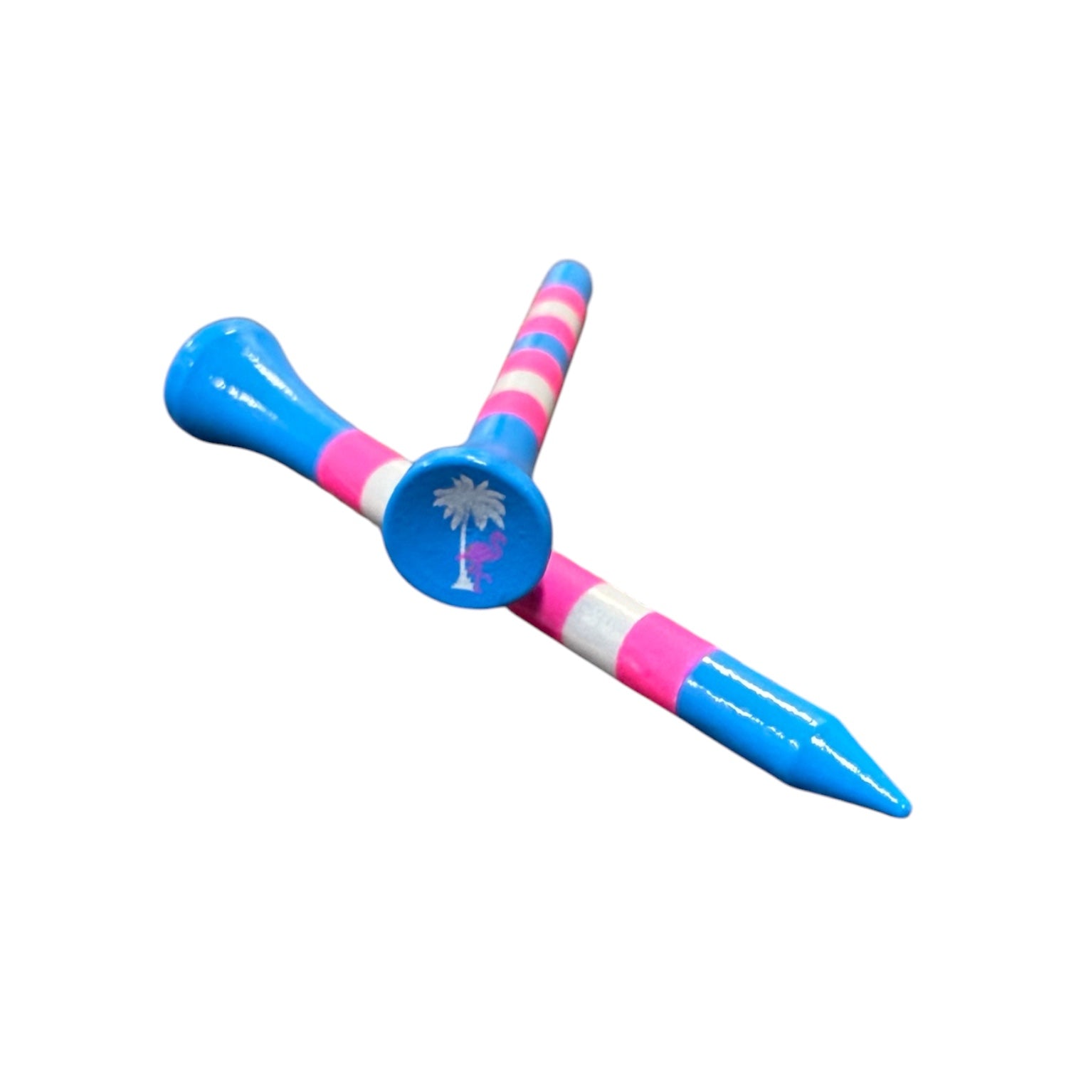 Two Blue Pink Stripe Premium Wooden Golf Tees (2 3/4”) are stacked on a white background; the top tee features a distinct palm tree design. From the 45-pack set of durable painted wood tees with unique designs.