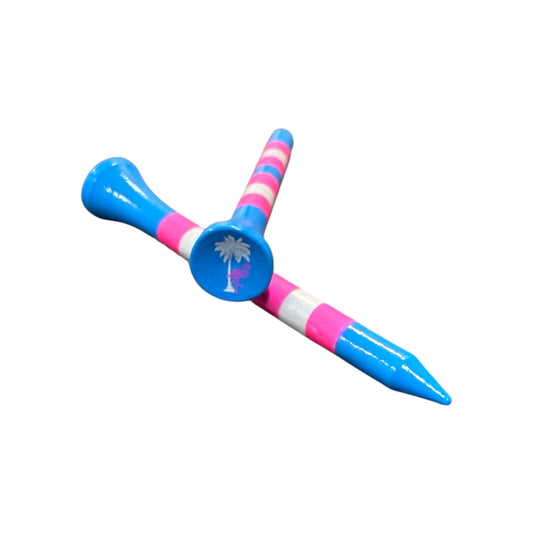 Two Blue Pink Stripe Premium Wooden Golf Tees (2 3/4”) are stacked on a white background; the top tee features a distinct palm tree design. From the 45-pack set of durable painted wood tees with unique designs.