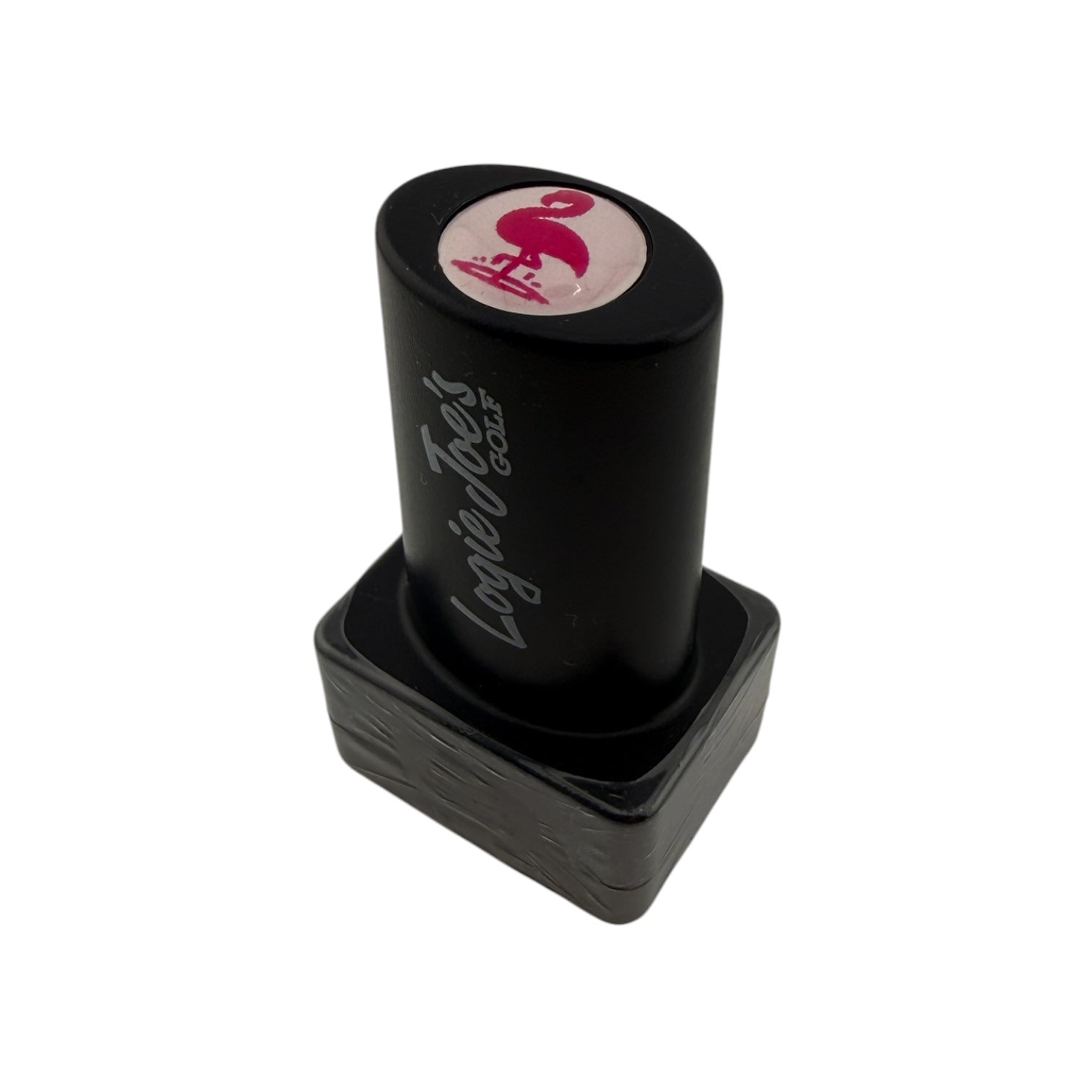 A self-inking Flamingo Golf Ball Stamp with quick-dry ink and a pink dollar sign on top, perfect for easy ball identification or as a fun golf gift. "Loyal Foxs Coils" is printed on the side. Shown on a white background.